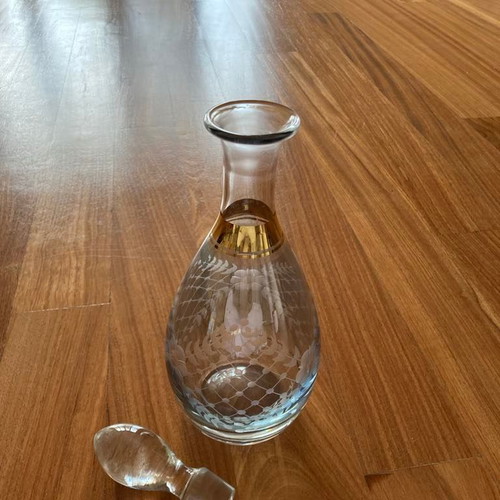 Crystal wine carafe with gold detail and engraved design