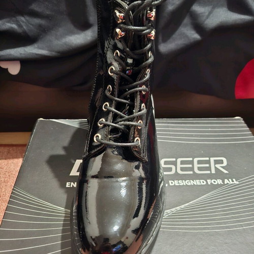 Women’s black patent leather boots like new with thick sole