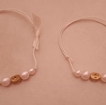 Bracelets with crosses like new, white and gold, set of 2