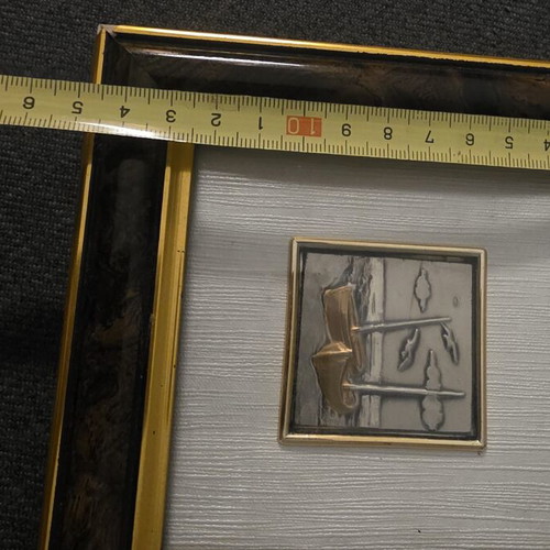 Decorative frame with embossed metal artwork used, made in Italy