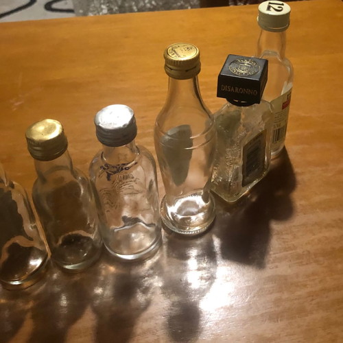 Glass miniature bottles used, pack of 7, vintage spirit collection