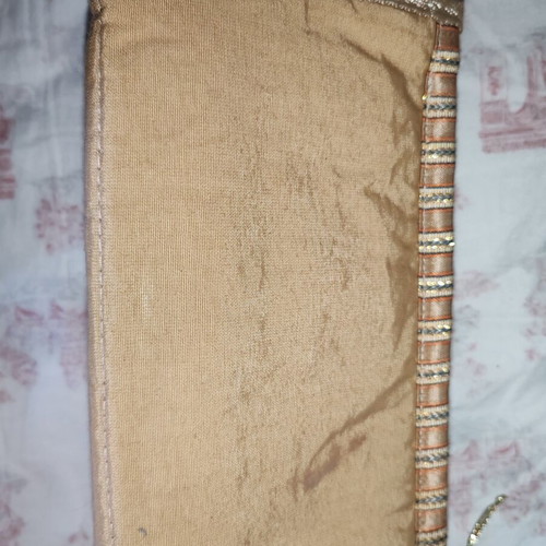 Ethnic fabric bag with embroidered camel and palm tree design
