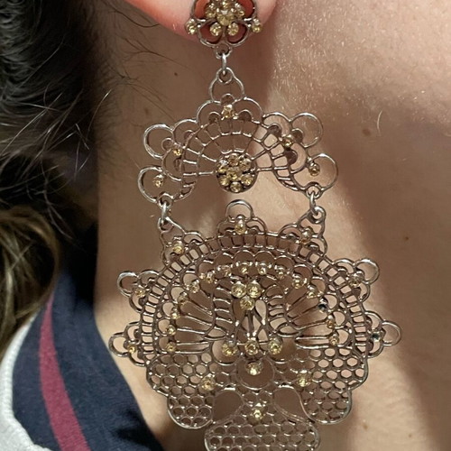 Long gold-plated earrings used with bronze-tone rhinestones