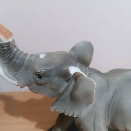Vintage decorative elephant used with wooden base