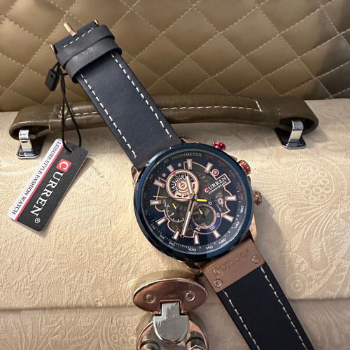 Curren men's watch new with leather strap blue and red