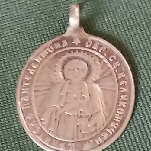 Silver medallion like new, antique with Saint Panteleimon and Virgin Mary