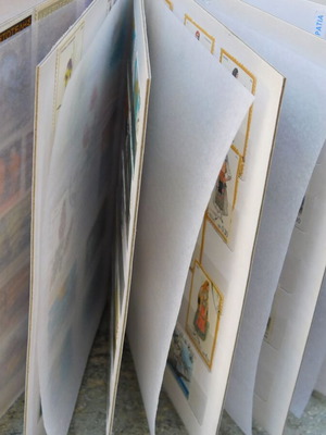 Blue stamp album with Greek stamps collection
