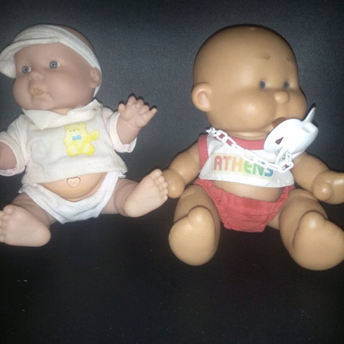 Baby dolls new, set of two mini with clothes and button function