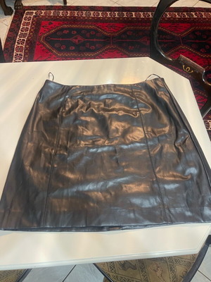 Synthetic leather skirt used, size M, black Marks & Spencer