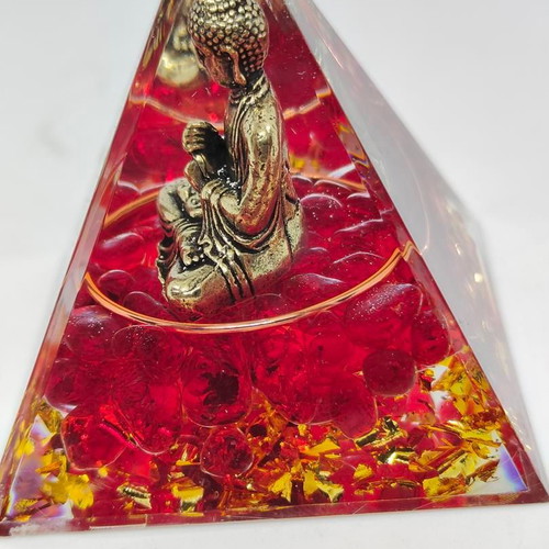 Orgonite pyramid with Buddha and red quartz like new