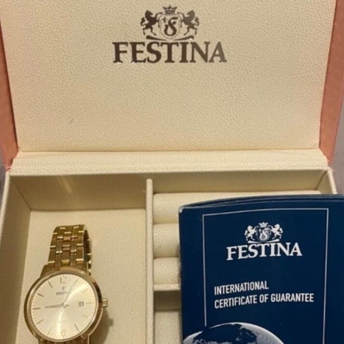 Festina women's watch like new, gold color