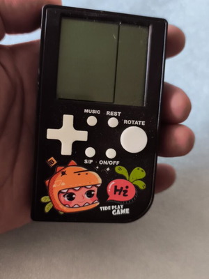 LUNA handheld electronic game with 26 games
