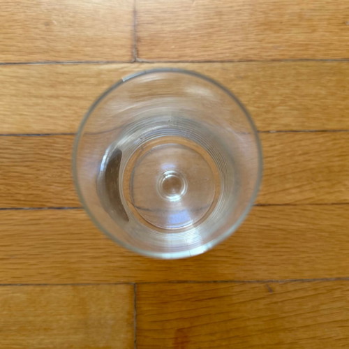 Drink glass with coin like new, collectible crystal stemmed