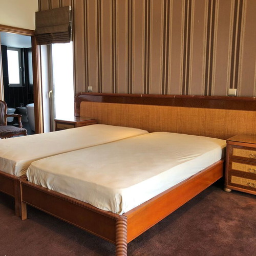 Bedroom set used with two single beds, nightstands and dressing table