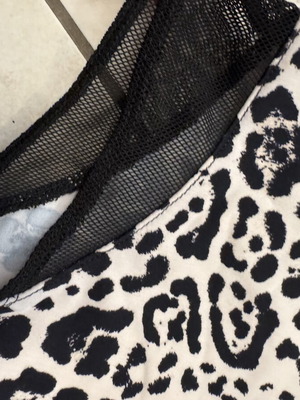 Animal print one-piece swimsuit with black mesh details