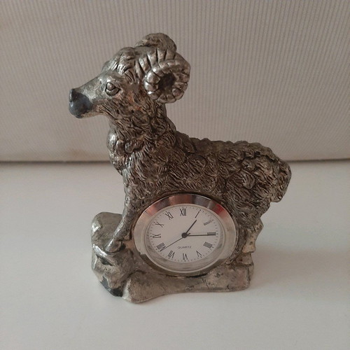 Vintage lead clock Aries used, analog tabletop