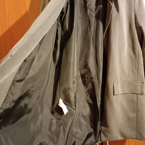 Jacket used, covers up to large, with decorative pockets