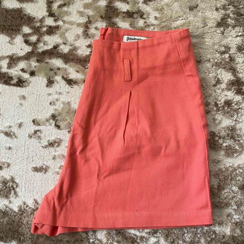 Coral shorts used, size 34
