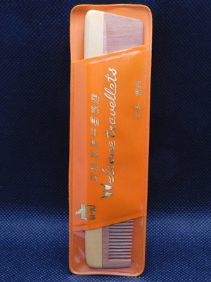 Wooden comb with travel case, vintage personal item