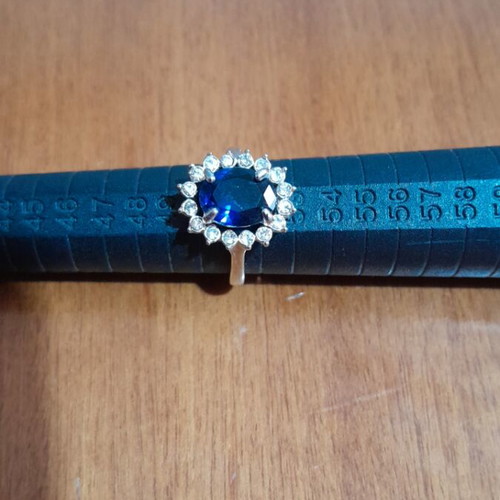 Ring with blue stone like new, silver color
