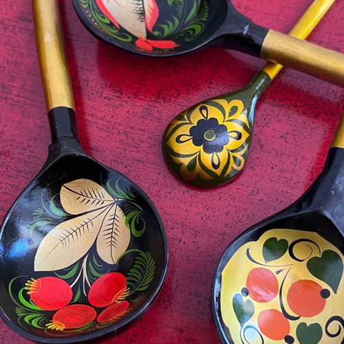 Decorative spoons used, set of 4 wooden with folk motifs