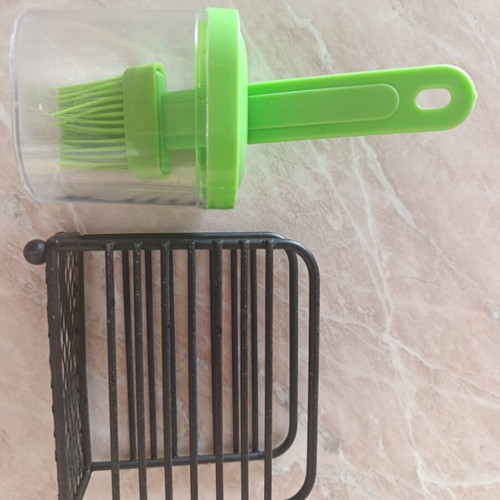 Kitchen brush with bowl and black napkin holder