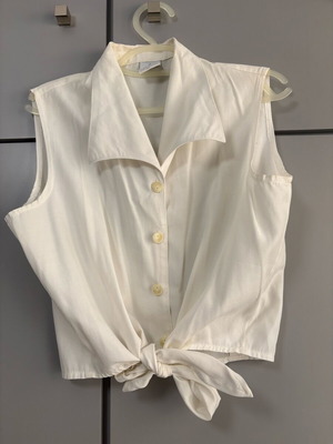 White sleeveless top with collar and front tie, size Large, like new