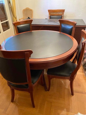 Dining table round with leather like new, includes 5 chairs