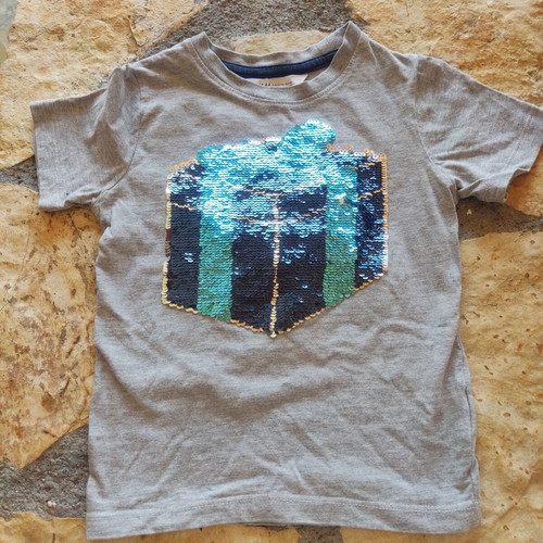 H&M T-shirt with reversible sequins, dinosaur design