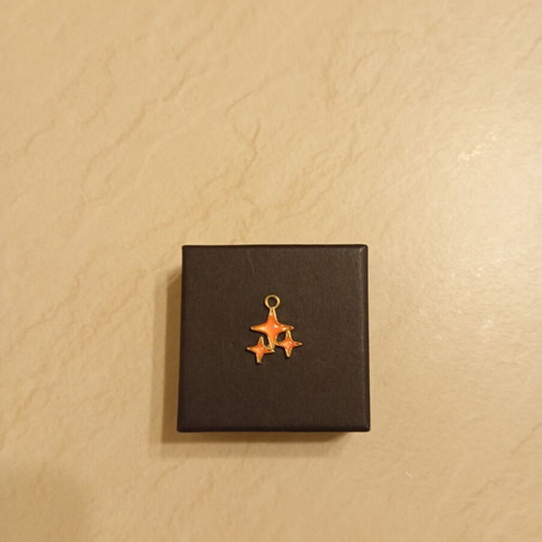 Pendant with star design, gold plated, new