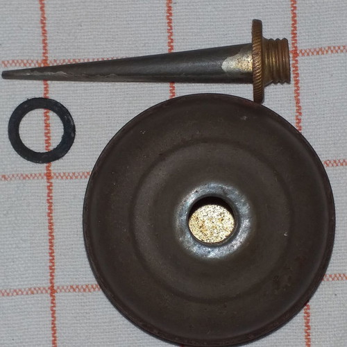 Set of 4 used oil collectors with iron, tin, and plastic