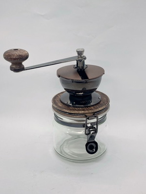 Hario manual coffee grinder like new with storage container
