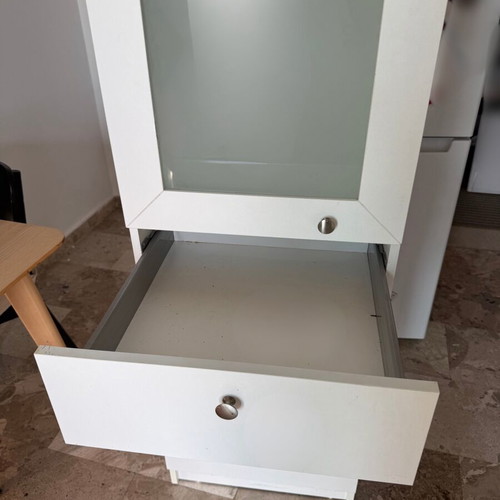 Wardrobe shelf used with three drawers and glass shelves