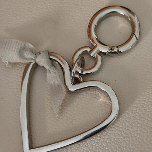 Burberry silver heart bag charm like new