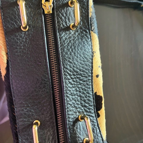 Kem leather crossbody bag used with animal print effect