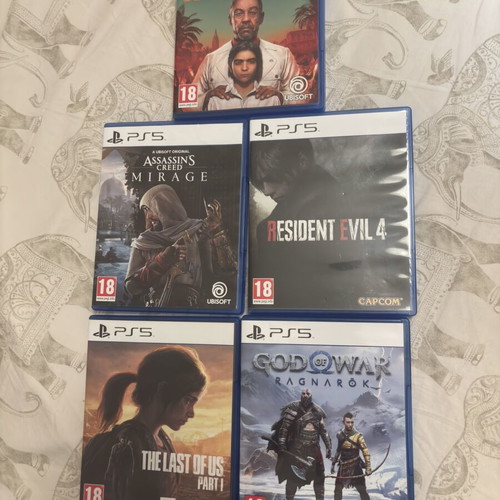 PS5 games bundle like new with 5 action and adventure titles