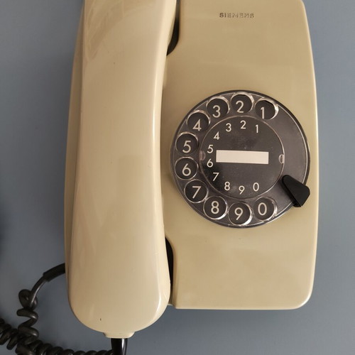 Siemens vintage telephone with rotary dial used