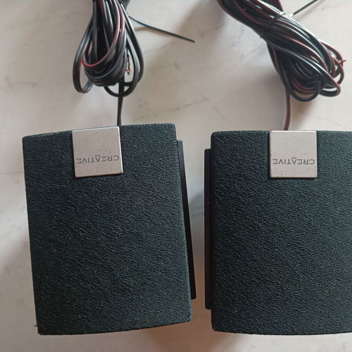 Creative surround speakers like new