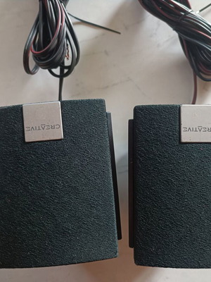 Creative surround speakers like new