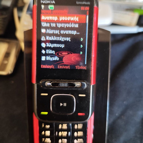 Nokia 5610 XpressMusic phone used with charger
