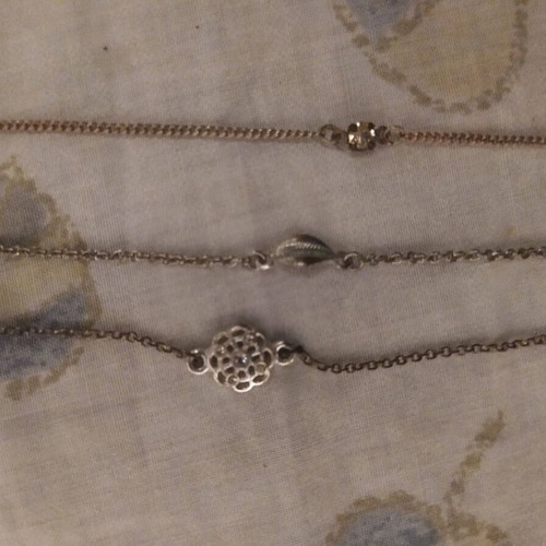 Anklets used, set of three, silver color