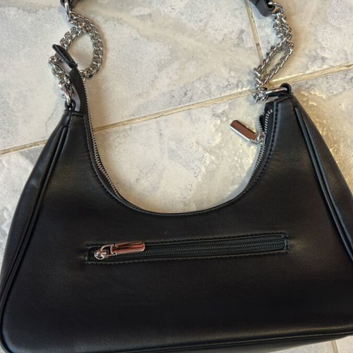 Black shoulder bag with silver chain strap, medium capacity