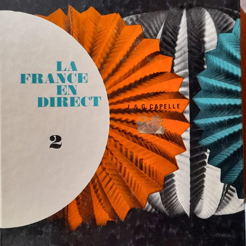 French language learning books used with handwritten notes