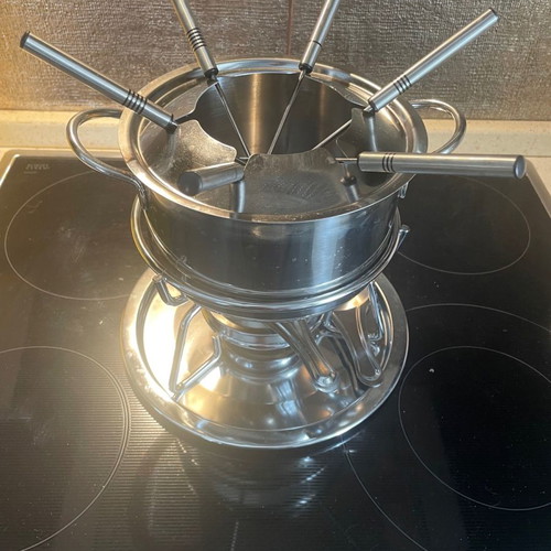 Fondue set used with 6 forks