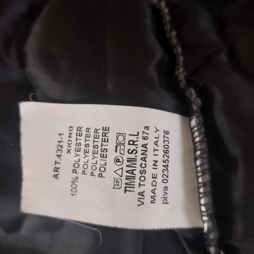 Long women's quilted black jacket like new
