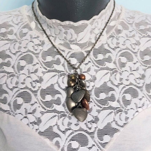 Choker necklaces like new with black ornaments, mother-of-pearl flowers and hearts