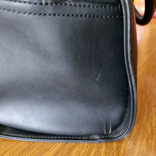 Love Moschino black hand bag like new with charms
