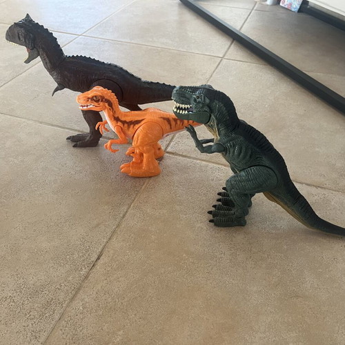 Dinosaur toys like new, 3 with sound and movement plus 1 gift
