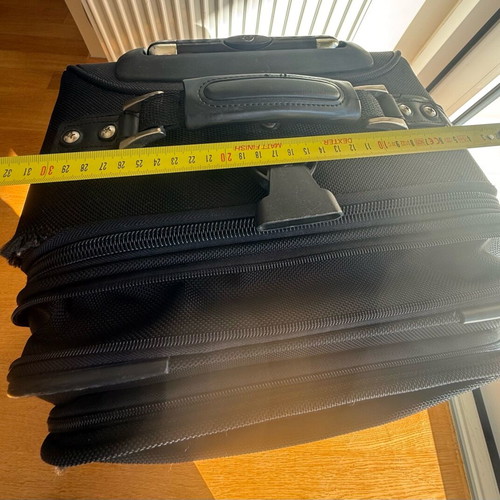 Delsey suitcase used with wheels small size black