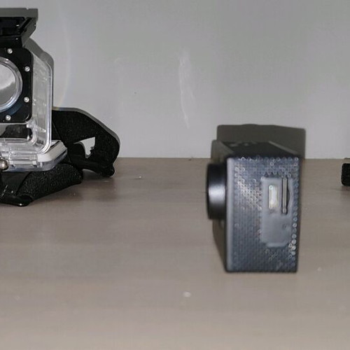 Action camera like new with waterproof case and mounting accessories